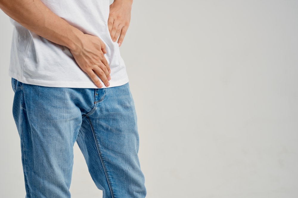 Pain,Below,The,Belly,Man,In,A,White,Tank,Top 1764650068 e48100289abd45c6b687b075340de86d 1