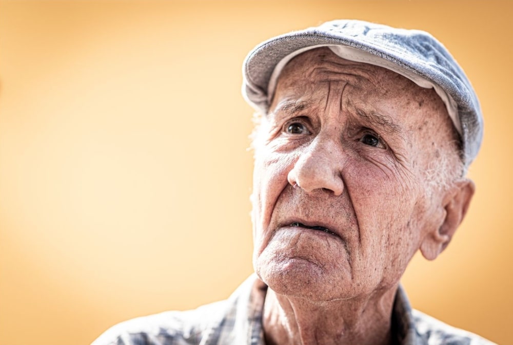old man looking quizzical
